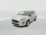 a white ford fiesta parked in a white room