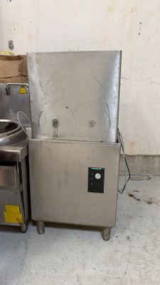 an image of a kitchen with a sink and a stove