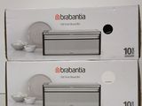two boxes of brabantia products sit side by side on a white surface