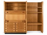 an image of a wooden bookcase with drawers and shelves