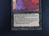 a picture of a card with a picture of a woman in a purple dress