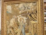 a picture of a painting hanging on a wall