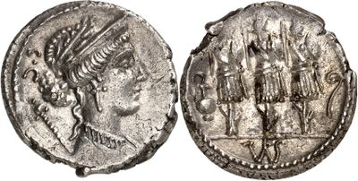 a silver coin with an image of a woman and a man on it