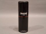 black spray bottle of deodorante on a white surface