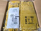 an open box of yellow clothing sitting on top of a cardboard box