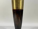 an image of a tall vase with a gold rim on a white background