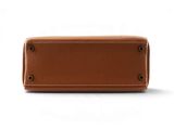 an image of a brown leather purse on a white background