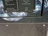 an image of a machine that is on the sidewalk