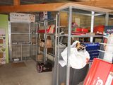 a garage with a lot of boxes and boxes on the shelves