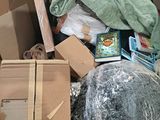 a cardboard box filled with various items in it