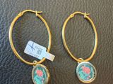 a pair of gold hoop earrings with flowers on them