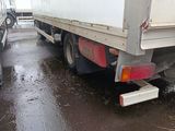 a truck that is parked on the side of the road