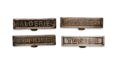 three antique cast iron nameplates with the names of different countries