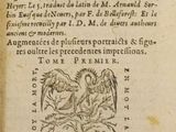 an old book with a picture of a dragon and a bird on it