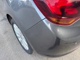 a car that is parked on the side of the street