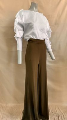 brown wide leg pants with a white shirt on a mannequin mannequin mannequin mannequin mannequin mannequin mannequin mann
