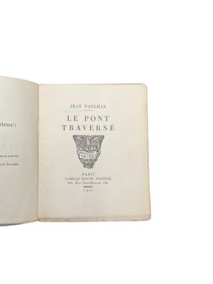 an open book with a picture of a cat on it