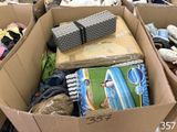 a box full of shoes and other items in it