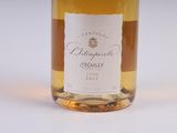 a bottle of wine that is sitting on a table