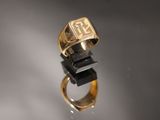 une image représentant une bague en or sur laquelle figure le chiffre 50