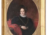 portrait of a woman in a black dress with a red chair