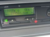 a radio in the center of a car with a green screen