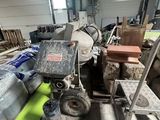 a lot of junk on the floor in a warehouse