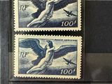 two stamps with a picture of a woman and an angel on them