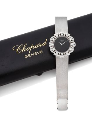 an image of a close up of a wrist watch with a case