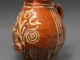 an image of a vase with a design on it