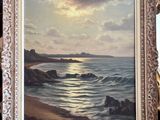 an oil painting of a sunset over the ocean on a table