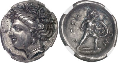 a close up of a silver coin with a woman on it
