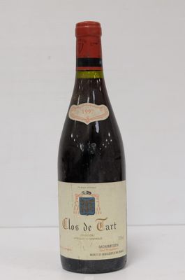 a bottle of wine that is sitting on a table