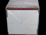 a white box with a red lid on a black background