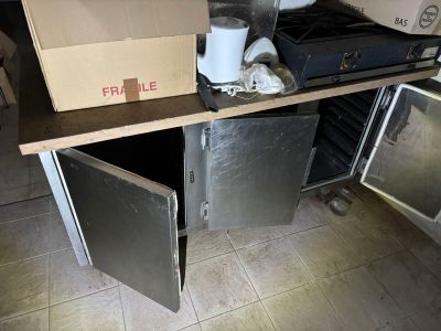 a box sitting on top of a counter next to a stove