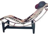 an image of a modern lounge chair with a leather seat