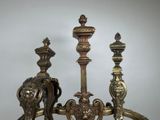 three candles that are sitting on top of a table