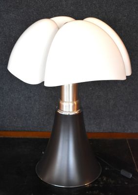 a lamp that is sitting on a black table