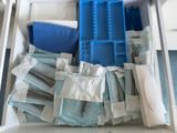 a drawer full of medical supplies in a hospital room