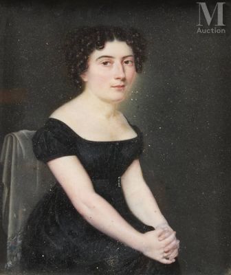 portrait of a woman in a black dress sitting on a chair