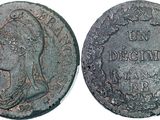 an old coin with a woman ' s face on it