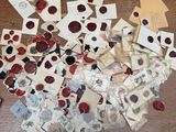 a table with a lot of postcards on it and a person standing next to it