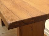an image of a wooden table in a room
