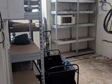 an image of a room with a lot of shelves and equipment