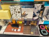 a display case with many different items on it