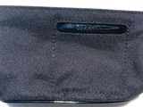 a black wallet that has a blue label on it
