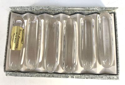 a box with six empty plastic spoons inside of it