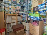 a room filled with lots of boxes and papers