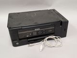 an image of a printer with a cable connected to it