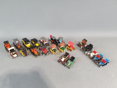 a lot of toy vehicles that are sitting on a table